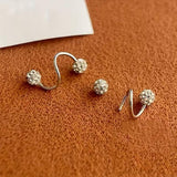 Ensemble de puces d'oreilles boules spirales et zircones