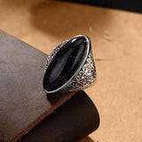 Bague rétro ovale en or blanc avec pierre