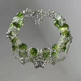 Bracelet rétro papillon et perles vertes