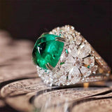 Bague fleur rétro avec pierre verte et zircones