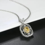 Collier rétro pierres jaunes et cristaux en or blanc