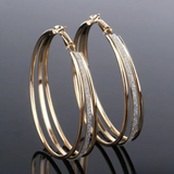 Boucles d'oreilles rétro en or blanc