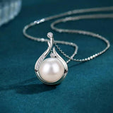 Retro-Kette in Weißgold mit Tropfenperlen