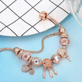 Rosa Traumfänger-Armband mit Anhängern in Weißgold