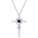 Collier croix avec cœur saphir | Or blanc