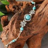 Bracelet papillon en or blanc