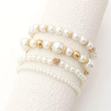 Ensemble de bracelets perles blanches