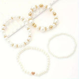 Ensemble de bracelets perles blanches