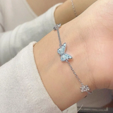 Ensemble : collier et bracelet papillon bleu lumineux