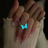Ensemble : collier et bracelet papillon bleu lumineux