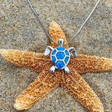 Ensemble : collier et boucles d'oreilles tortue de mer opale et or blanc