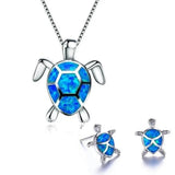 Ensemble : collier et boucles d'oreilles tortue de mer opale et or blanc