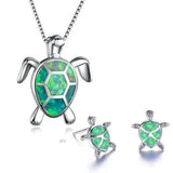 Ensemble : collier et boucles d'oreilles tortue de mer opale et or blanc