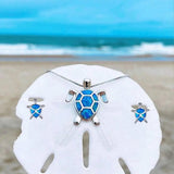 Ensemble : collier et boucles d'oreilles tortue de mer opale et or blanc