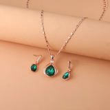 Ensemble : collier et boucles d'oreilles cristal vert en or