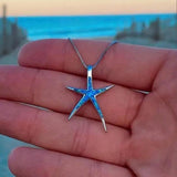 Pendentif étoile opale bleue en or blanc