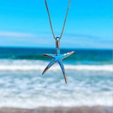 Pendentif étoile opale bleue en or blanc