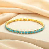 Bracelet tennis rond turquoise | Or