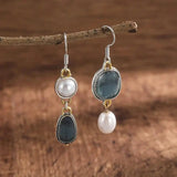 Boucles d'oreilles asymétriques pierres bleues et perle