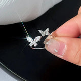 Bague papillon ajustable en or blanc
