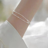 Bracelet ajustable en or blanc avec cœur