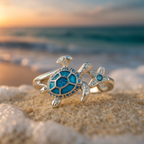 Bague en or blanc tortue et opale bleue