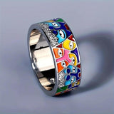 Bague en or blanc yeux colorés