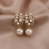Boucles d'oreilles fleur et perle